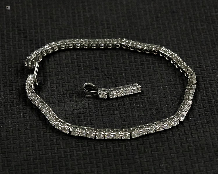 After #193 White Gold Diamond Gemstone Tennis Bracelet Being Sized with a Pendant Conversion