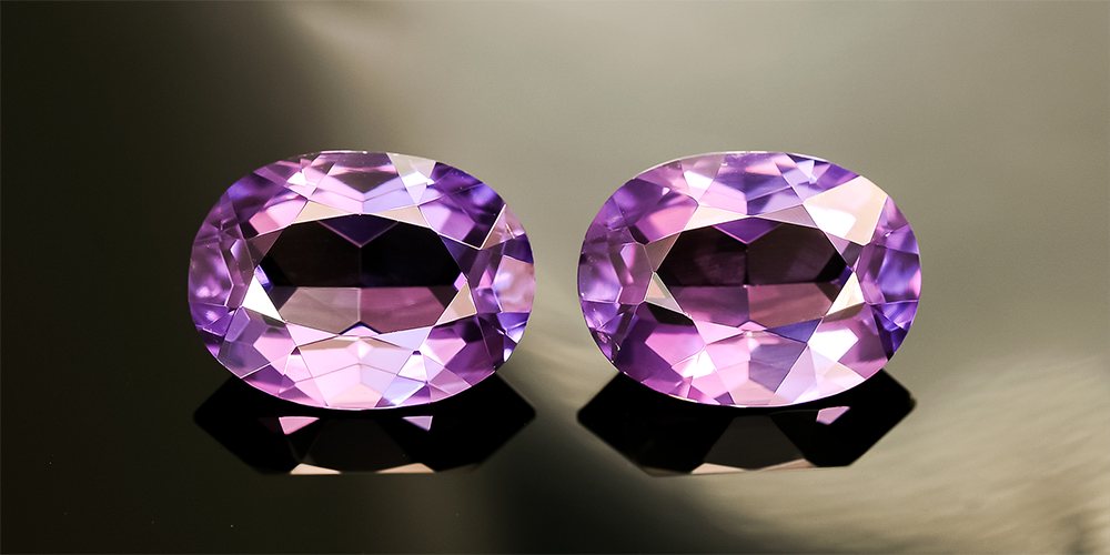 Two Loose Alexandrite Gemstones on Display for Replacement Services